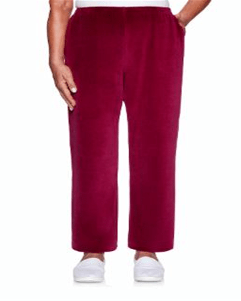 Front of a model wearing a size 2X Alfred Dunner Women's Idea Velour Pants Red 2X in Red by Alfred Dunner. | dia_product_style_image_id:307368